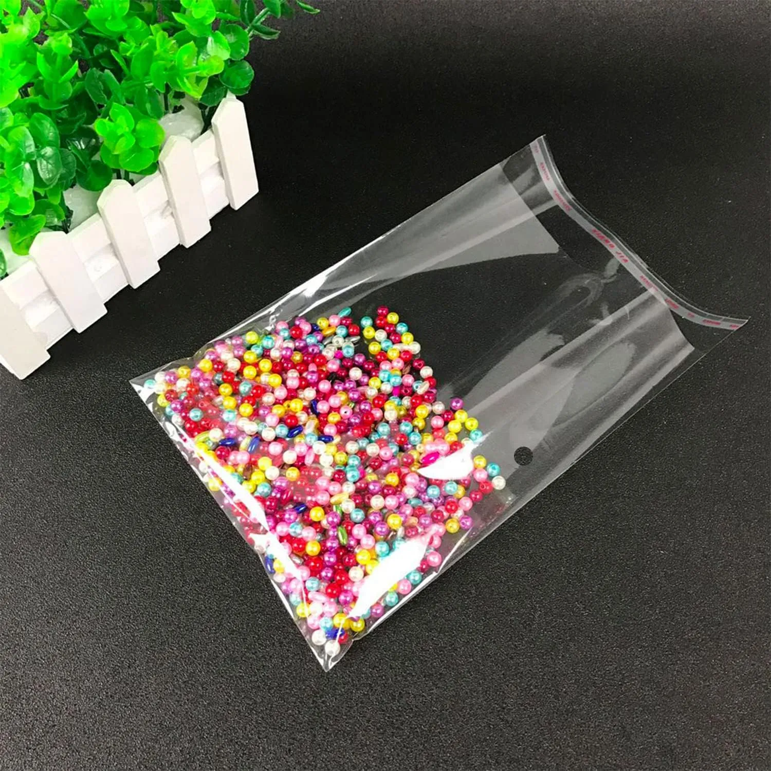 900 Pcs Clear Plastic Bags, 4 Mixed Sizes Resealable Cello Bags Recloseable Cellophane Bags Self Adhesive Cellophane Treat Bags OPP Plastic Bags for Cookies(3.5X6.3'', 4X7'', 5.1X7'',6.7X9.8'')